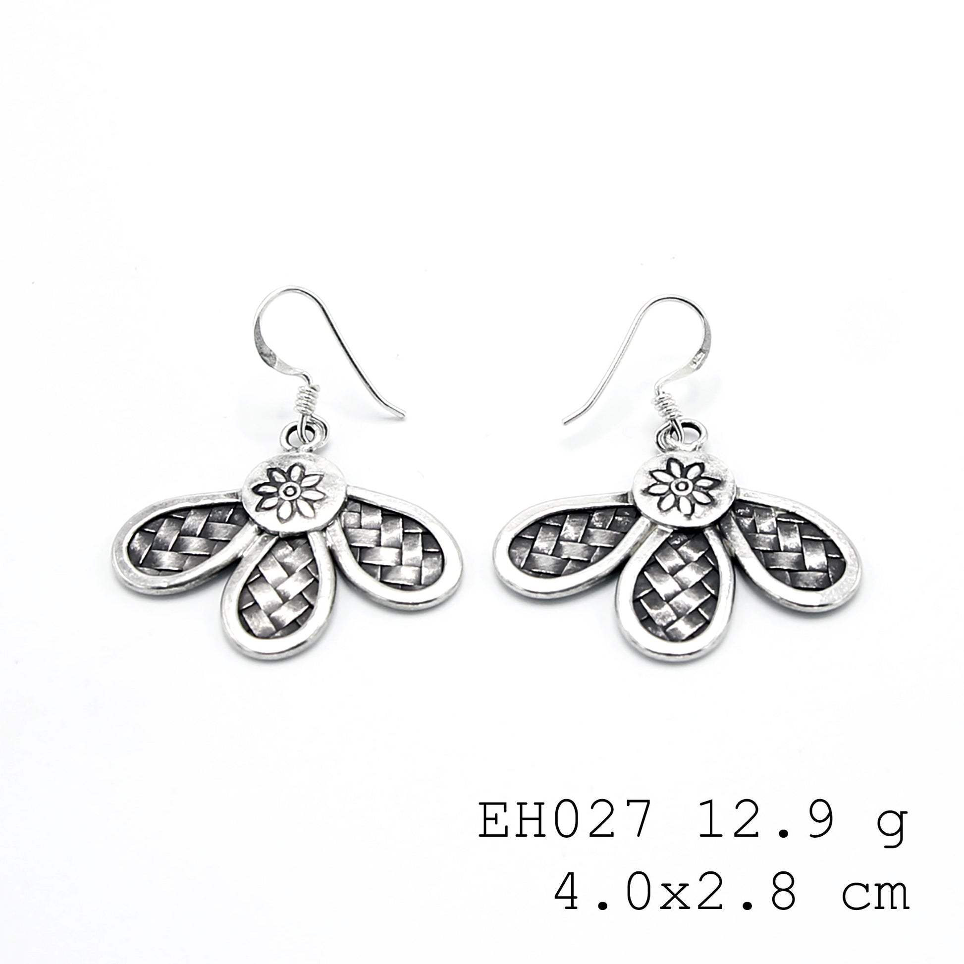 Simply exquisite woven silver earrings.