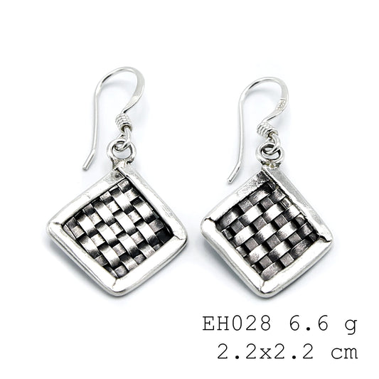Purely polished handmade silver earrings.