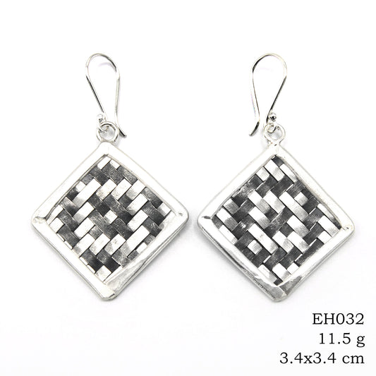 Your daily dose of woven silver earrings.