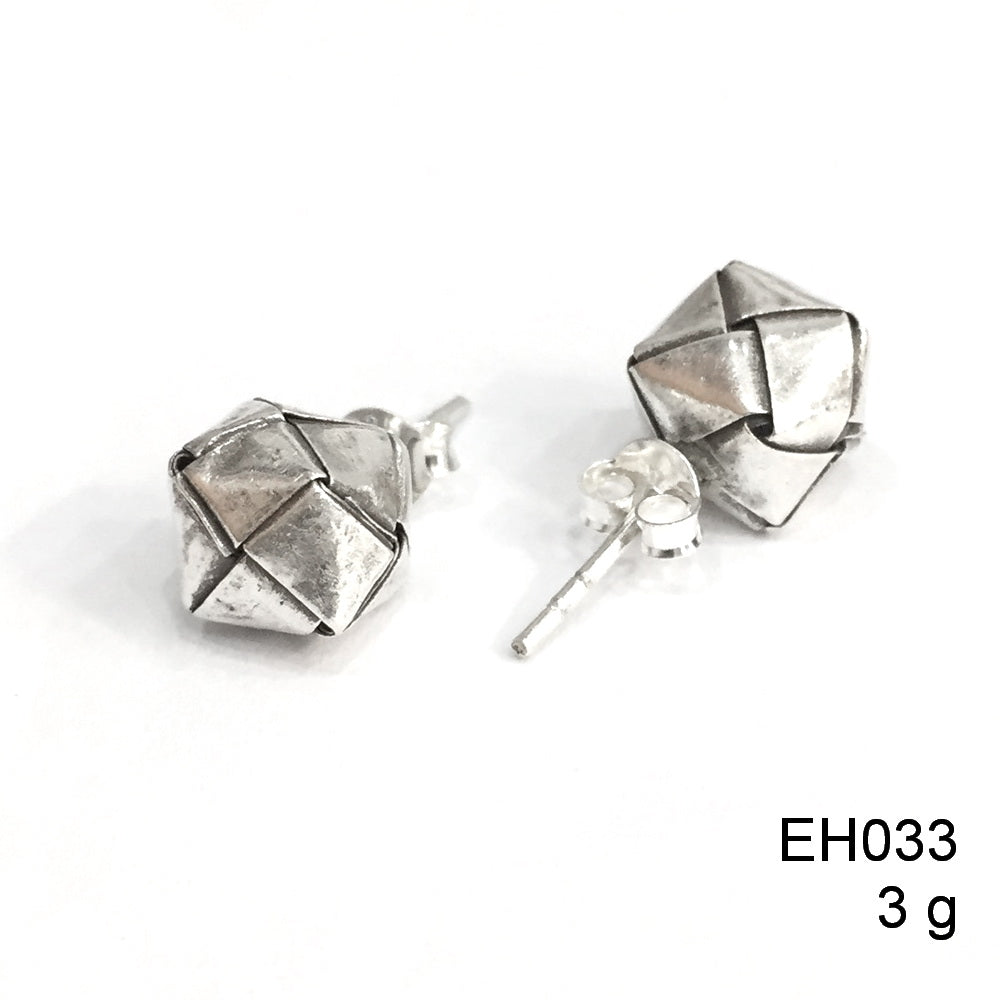 Intricately woven, purely beautiful silver earrings.