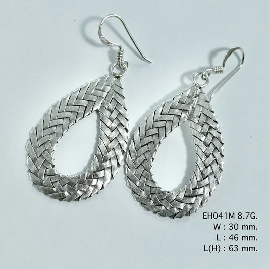 Woven by hand, worn with love: silver earrings.