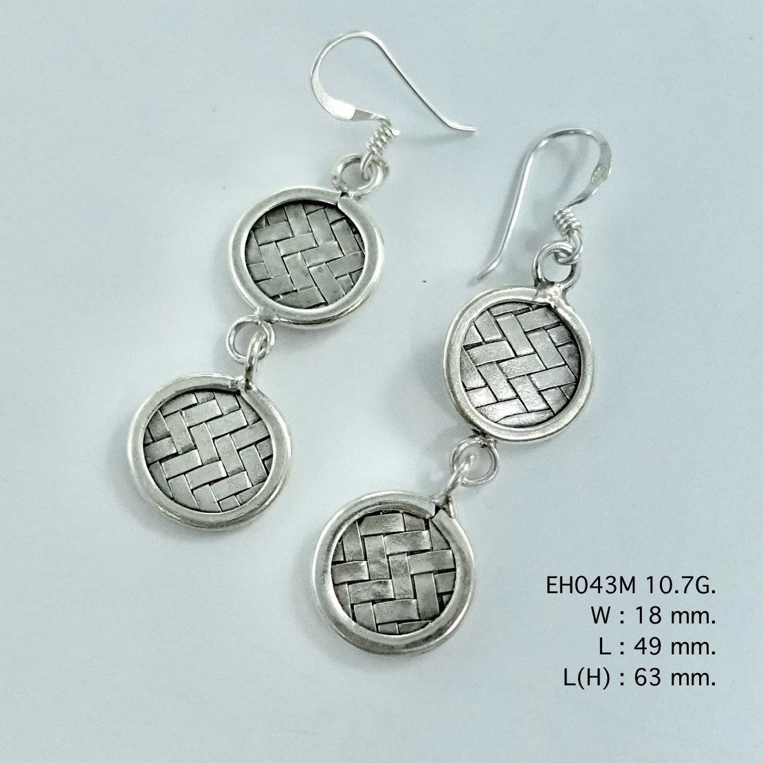 Hand-braided perfection in these silver earrings.