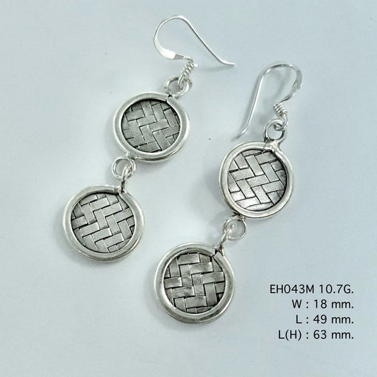 Hand-braided perfection in these silver earrings.
