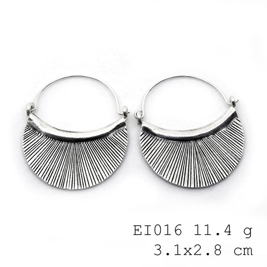 Purely charming bag-shape silver earrings.