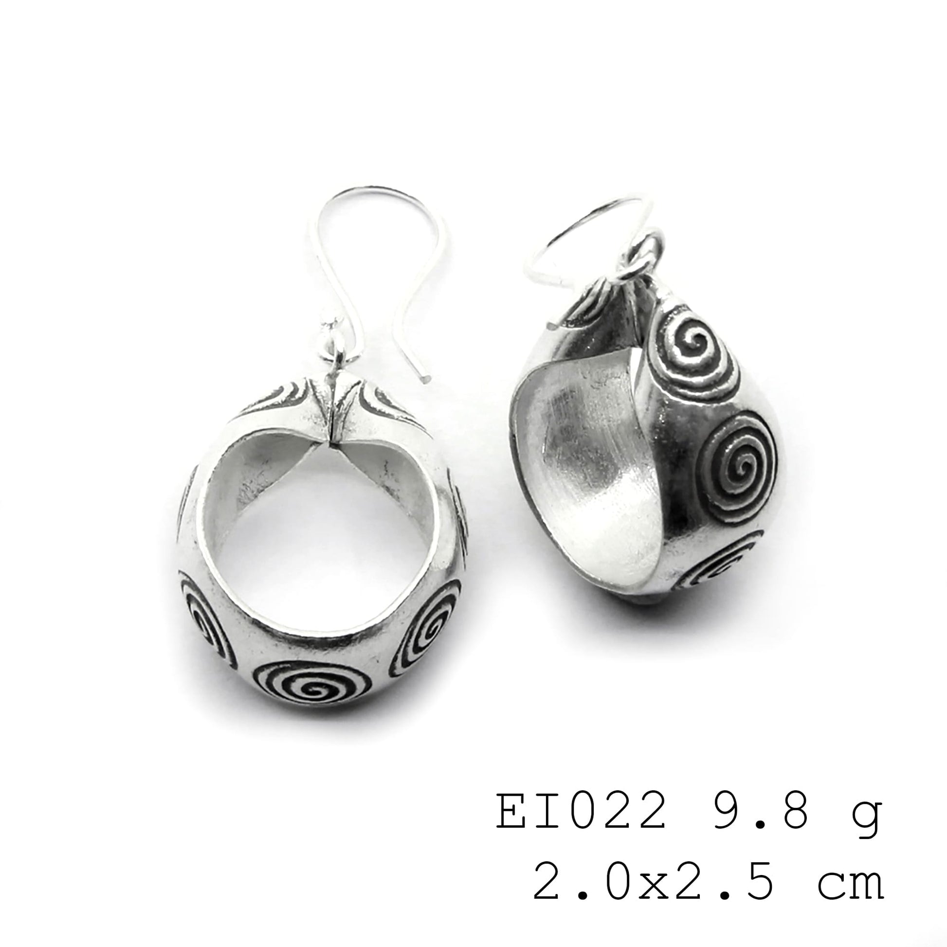 Small bags, big statement: handmade silver earrings.