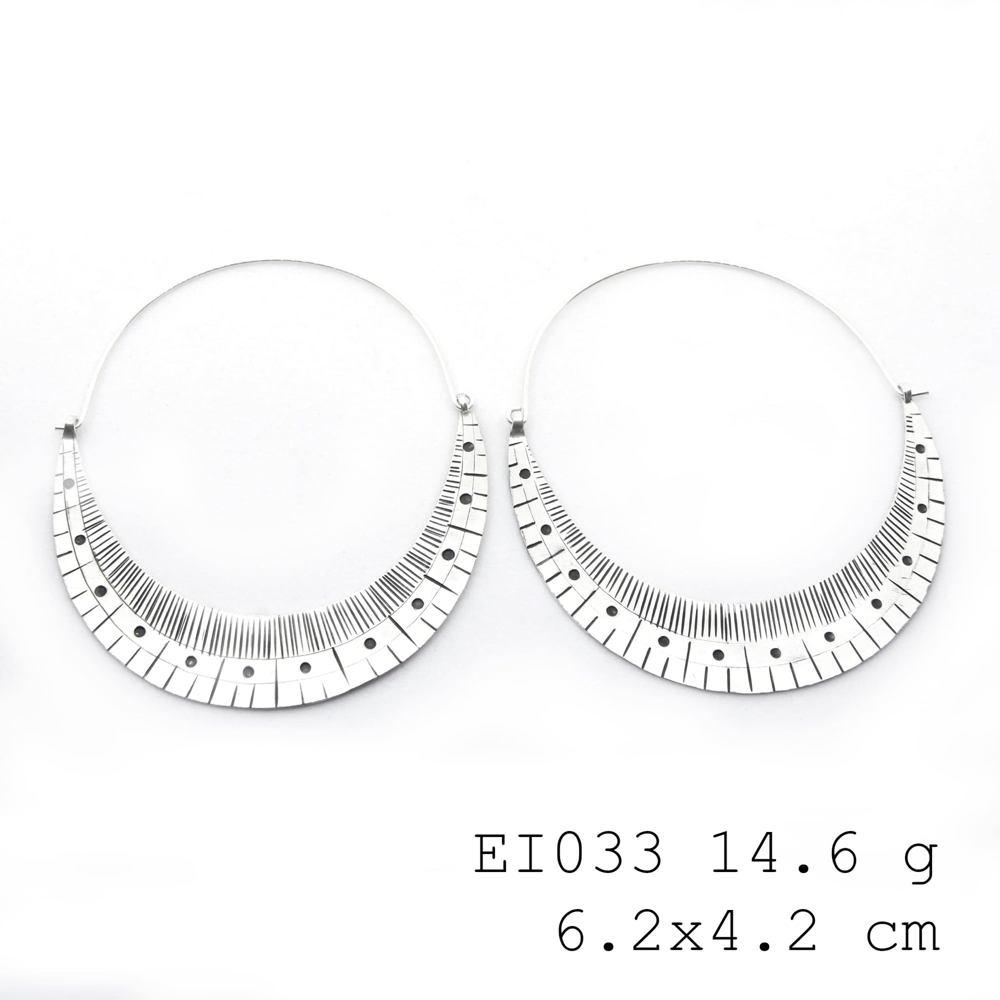 Pure silver craftsmanship in these unique silver earrings.