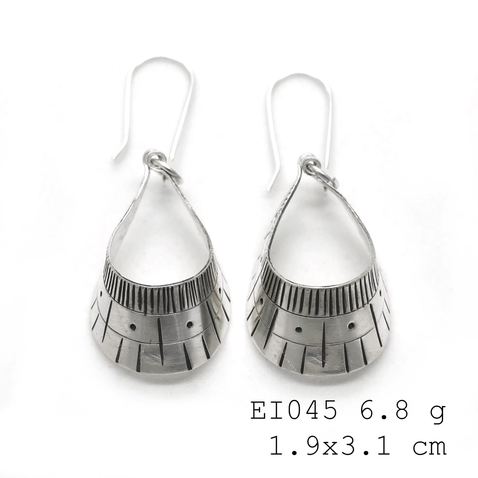 Unique handmade luxury in these silver earrings.