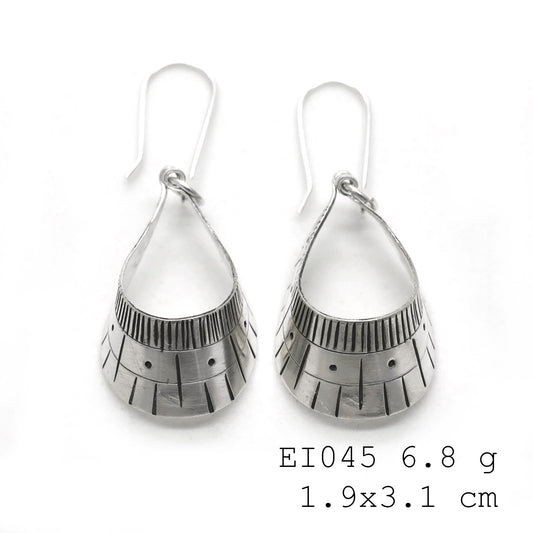 Unique handmade luxury in these silver earrings.