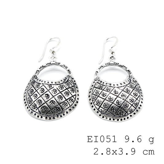Artisan-made bag-shape silver earrings for your collection.