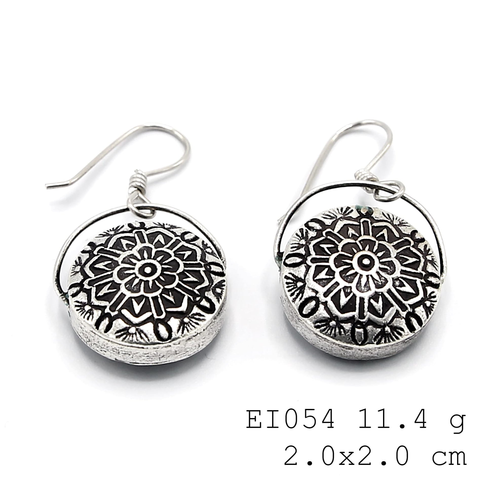 Elegance is in the details of these silver earrings.