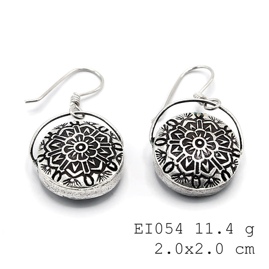 Elegance is in the details of these silver earrings.