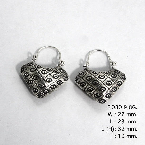 Whimsical and wonderful bag-shape silver earrings.