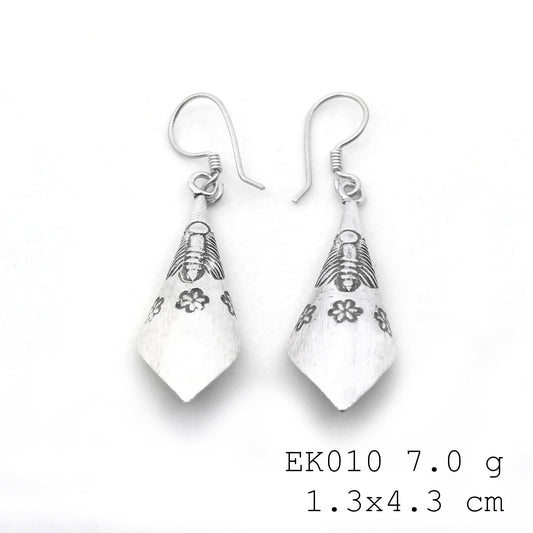 Pure silver excellence in these handmade silver earrings.