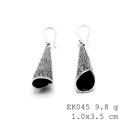 Artisan-crafted texture on these funnel silver earrings.