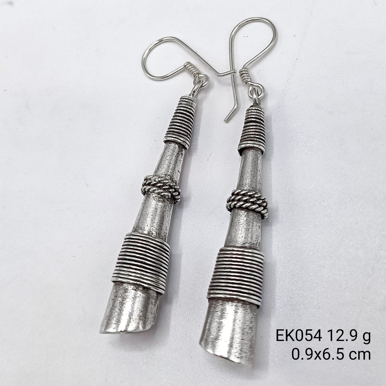 Architectural elegance in every pair of silver earrings.