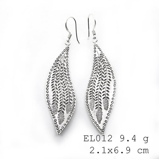 Feel the artisan touch in these silver earrings.
