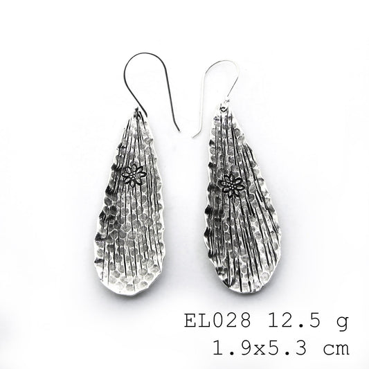 The beauty of a leaf in pure silver earrings.