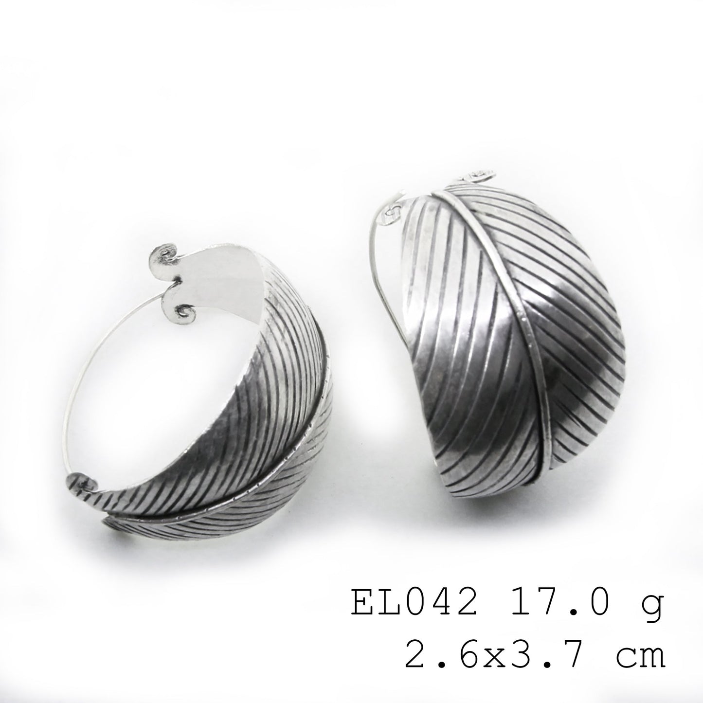 Intricate leaf patterns on our pure silver earrings.
