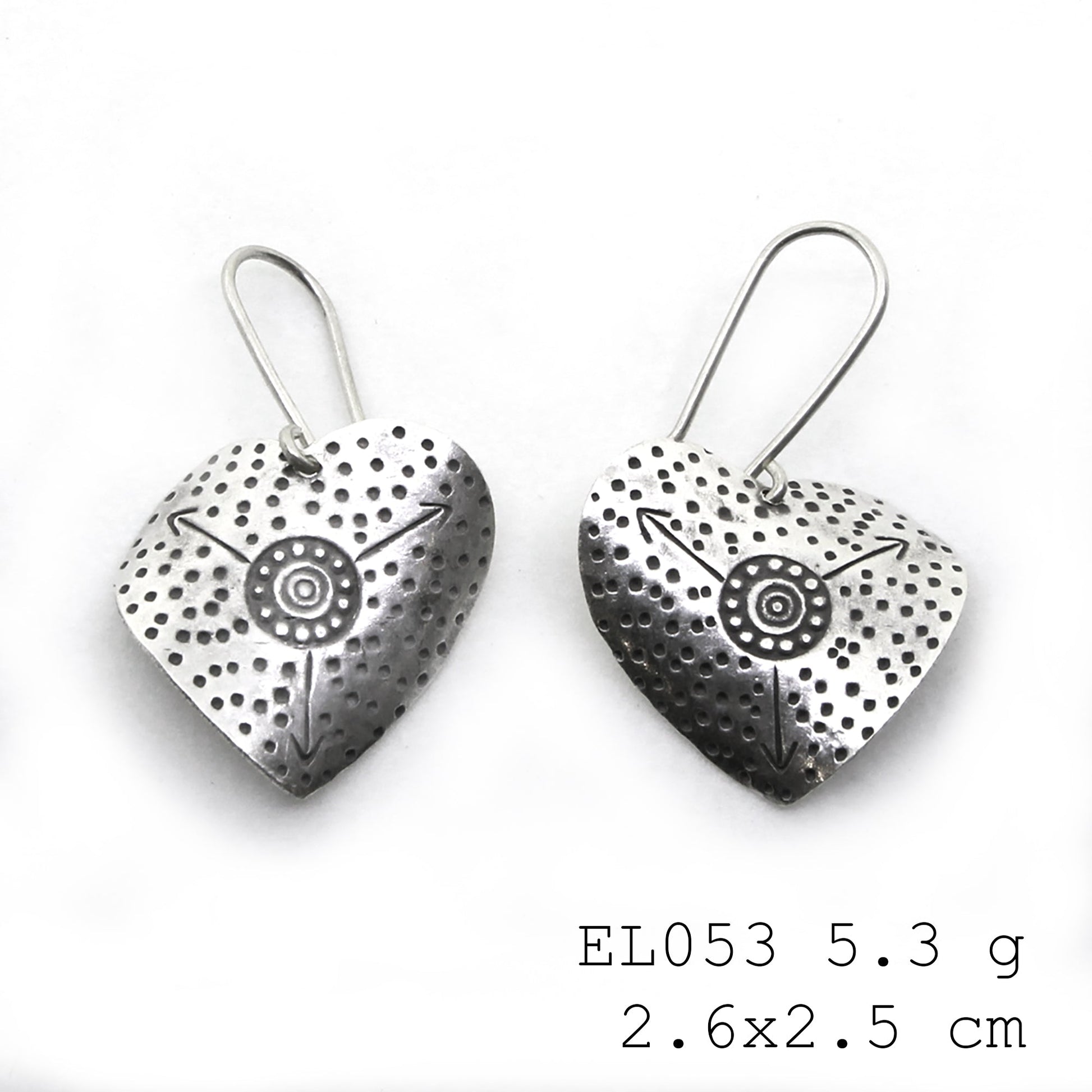 Timeless leaf designs in handmade silver earrings.