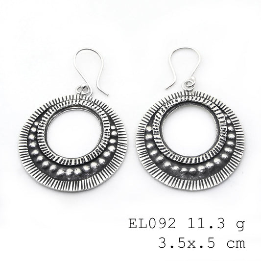 Polished to perfection: leaf-shape silver earrings.