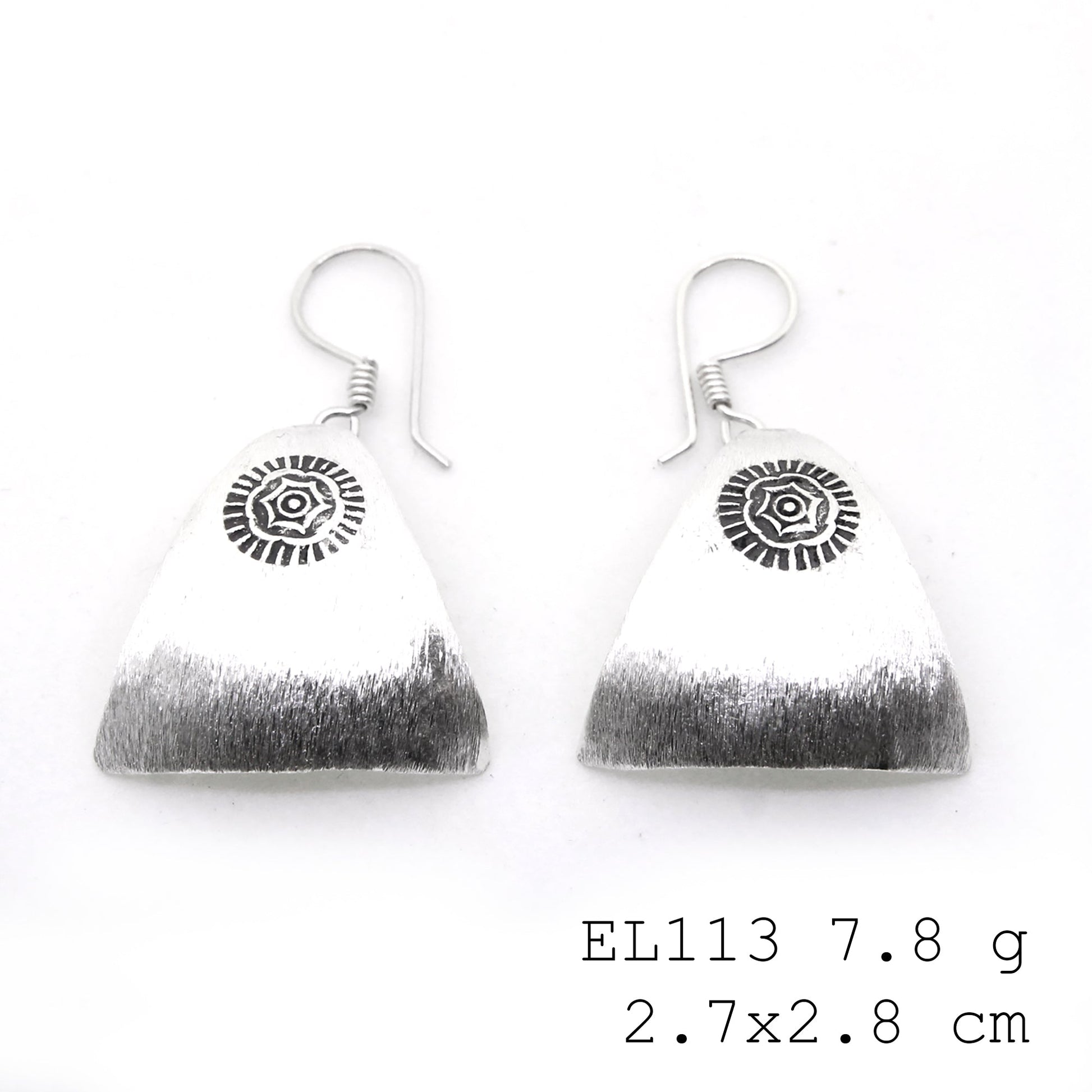 Organic textures on these pure silver earrings.