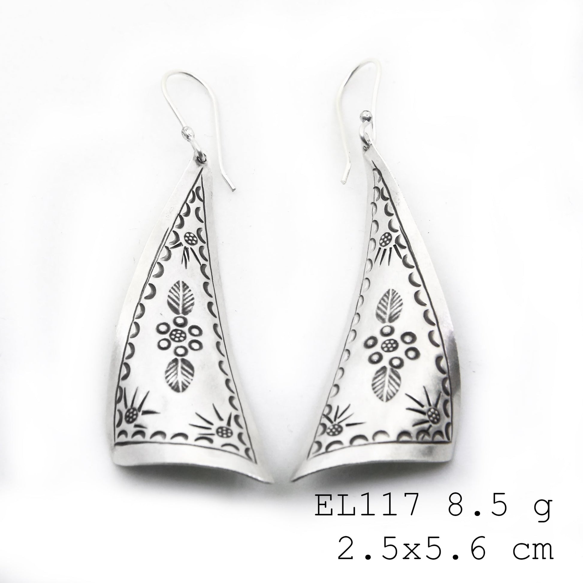 Masterfully crafted leaf-silhouette silver earrings.