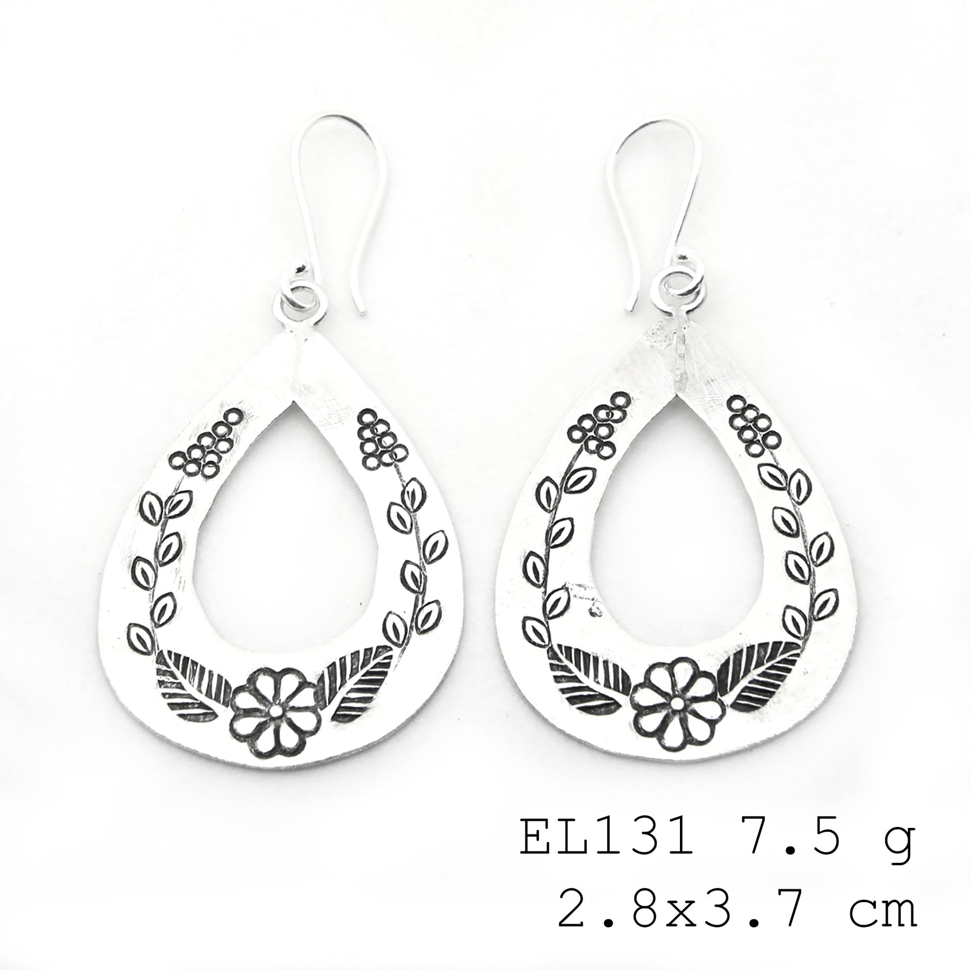 Artisan excellence in every leaf-shape silver earrings.