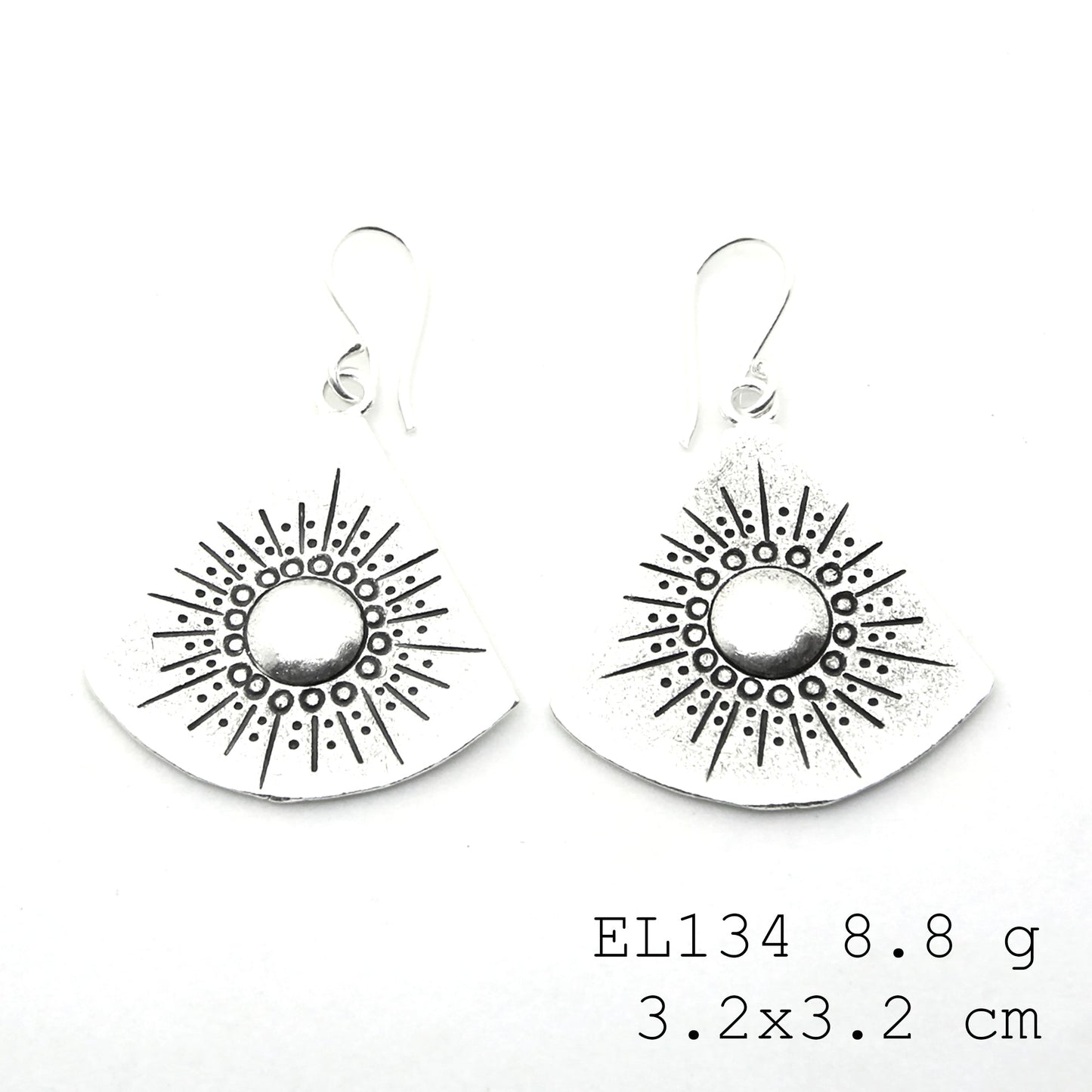 Hand-carved elegance in every silver earrings pair.