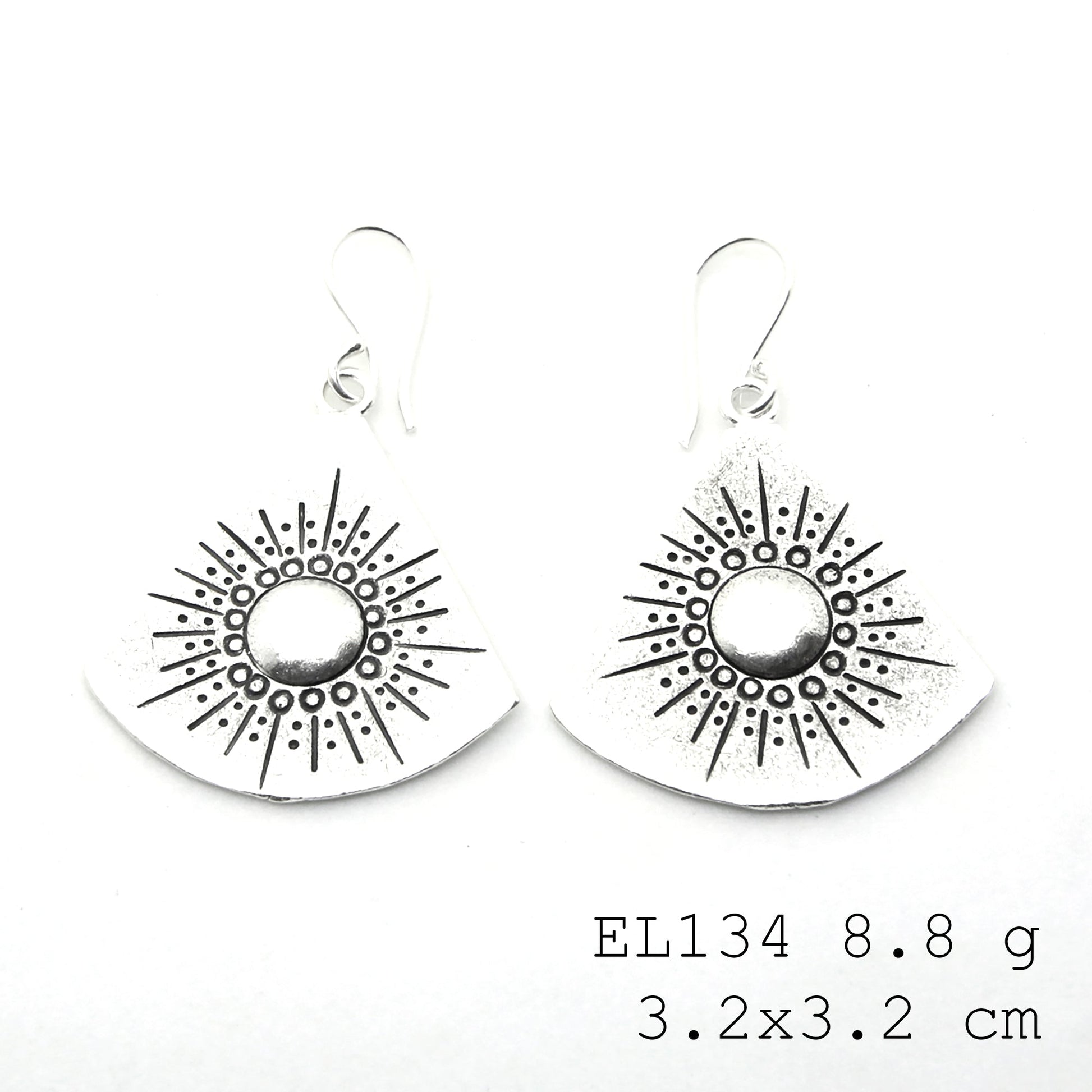 Hand-carved elegance in every silver earrings pair.