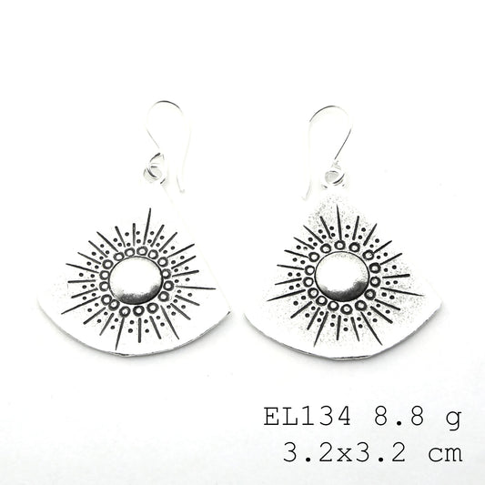 Hand-carved elegance in every silver earrings pair.