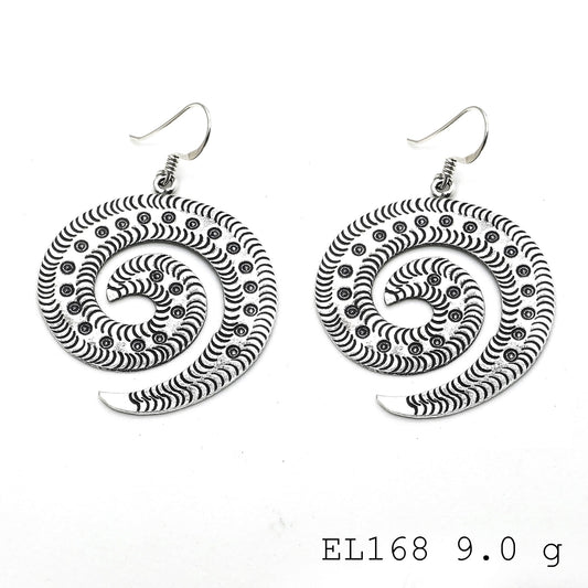 A leaf-inspired masterpiece: handmade silver earrings.