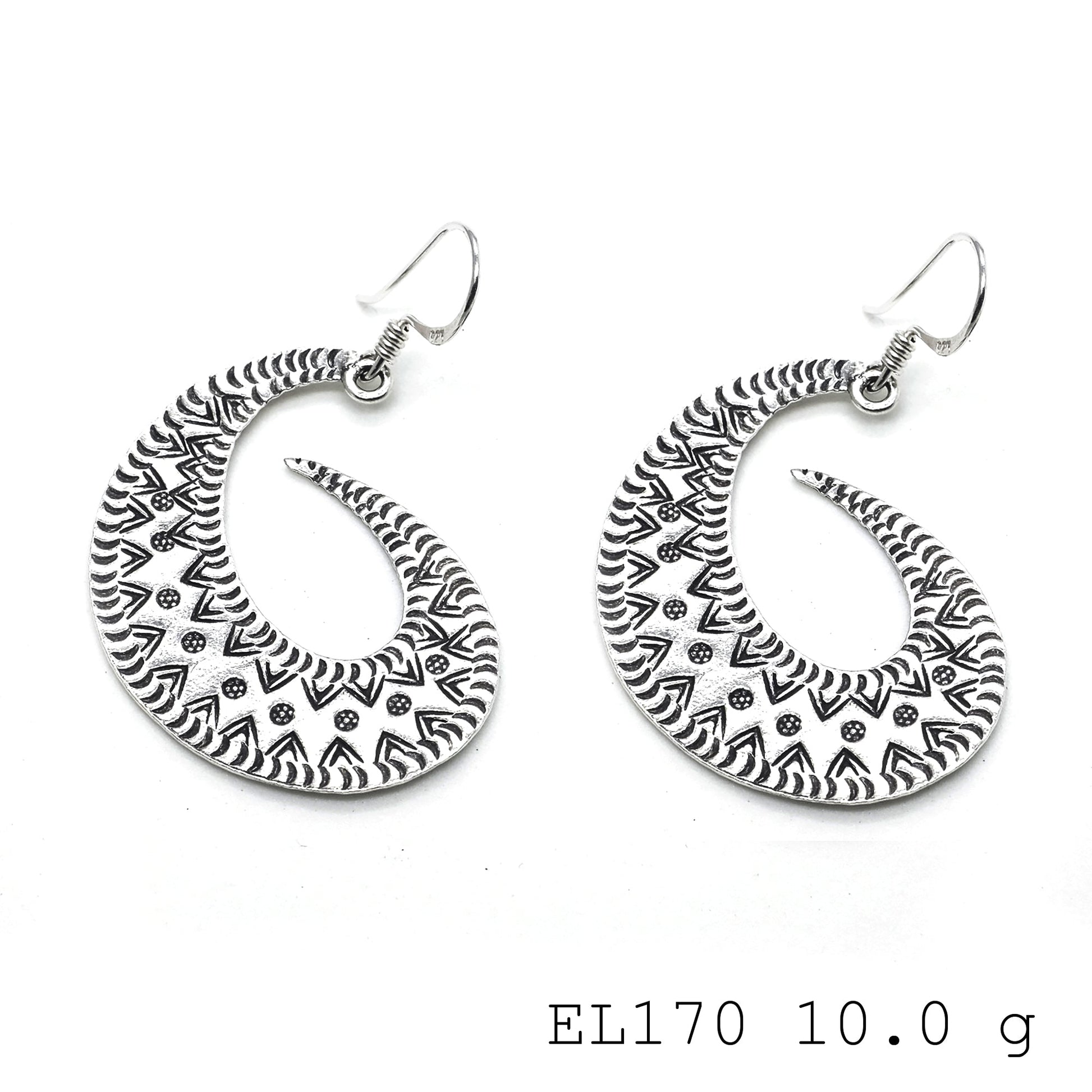 Artisan-made luxury in these silver earrings.