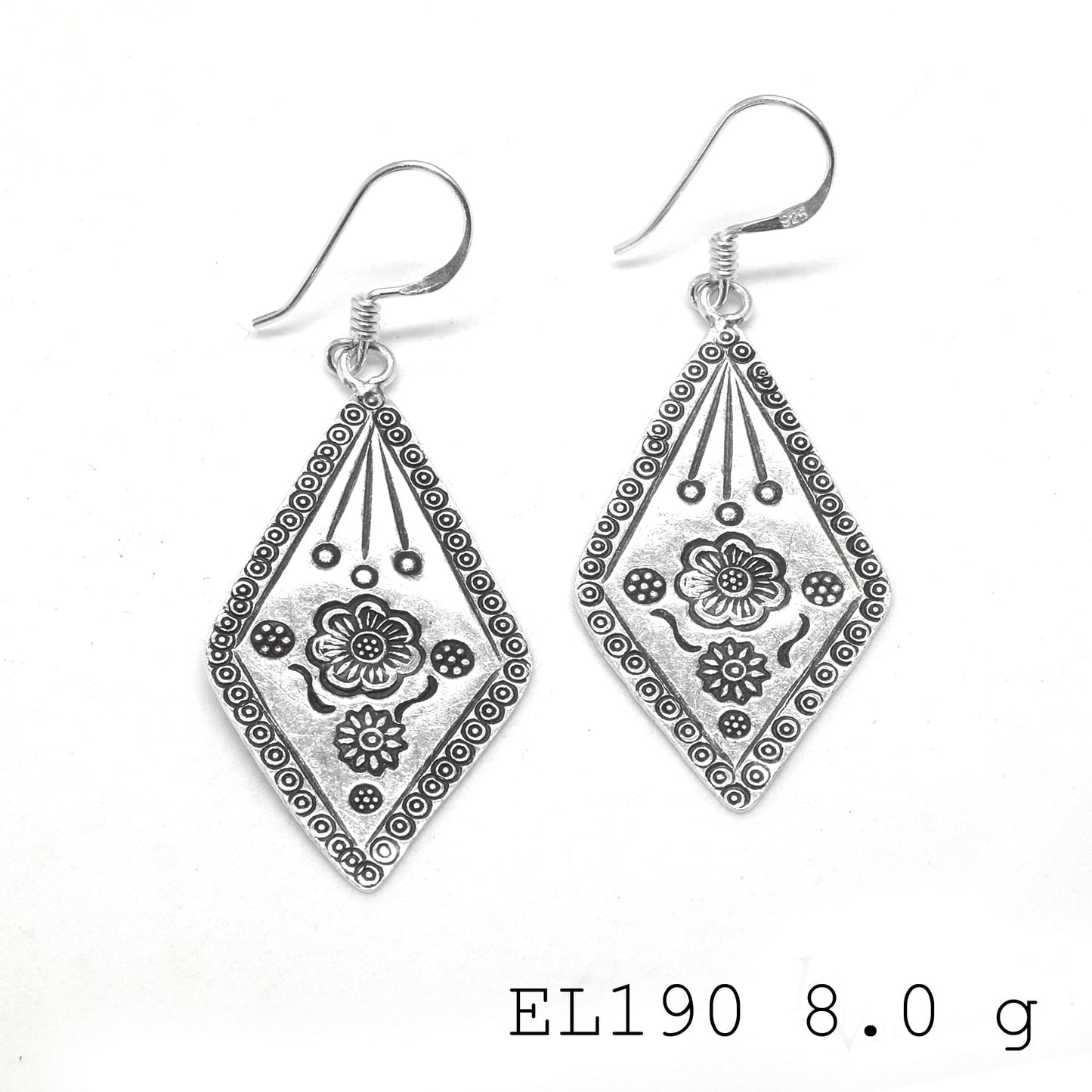 Fine craftsmanship defines these leaf silver earrings.