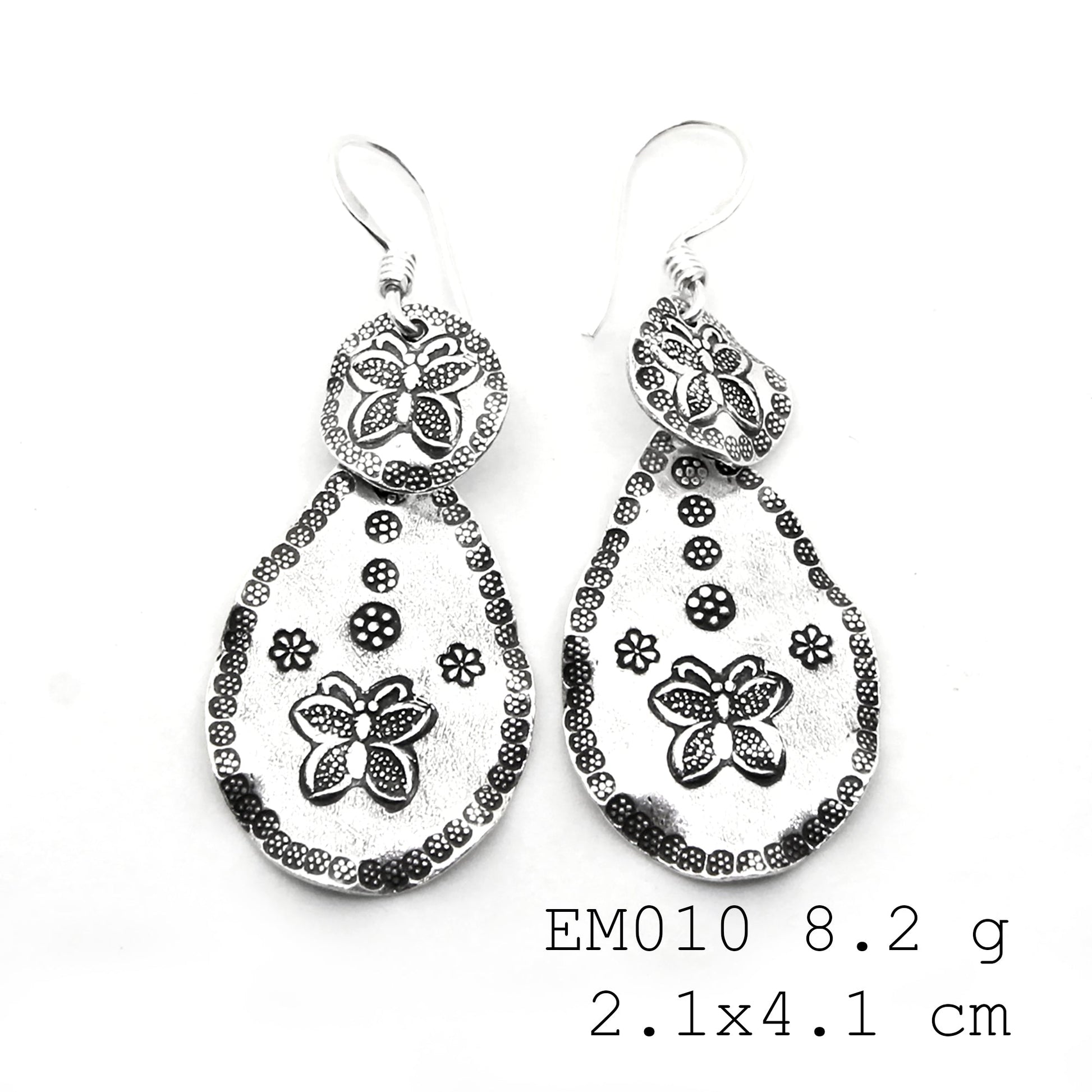 Elevate your look with 98% pure handmade silver earrings.