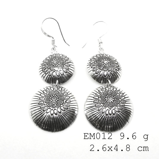 Level up your accessory game with these silver earrings.