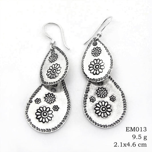 Wear them once, love them forever: Handmade silver earrings.