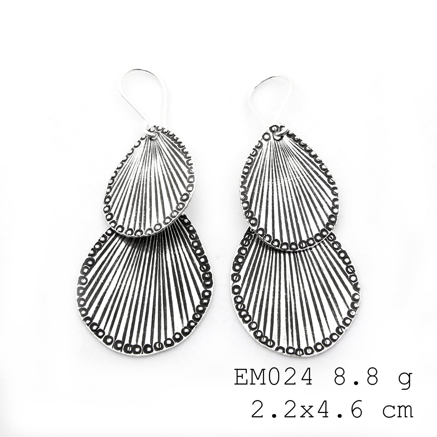 Handmade beauty in these silver earrings.