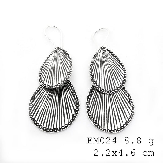Handmade beauty in these silver earrings.