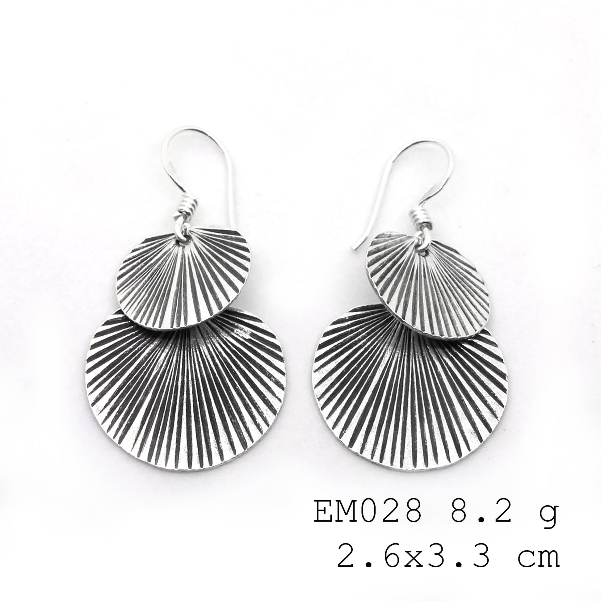 Experience the glow of 98% pure silver earrings.