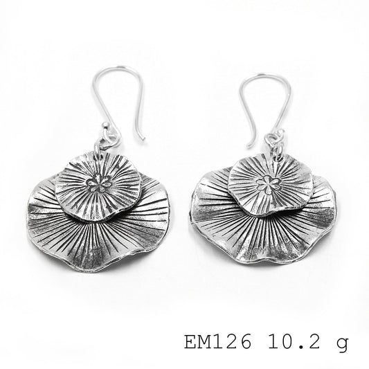 Make a statement in our tassel silver earrings.