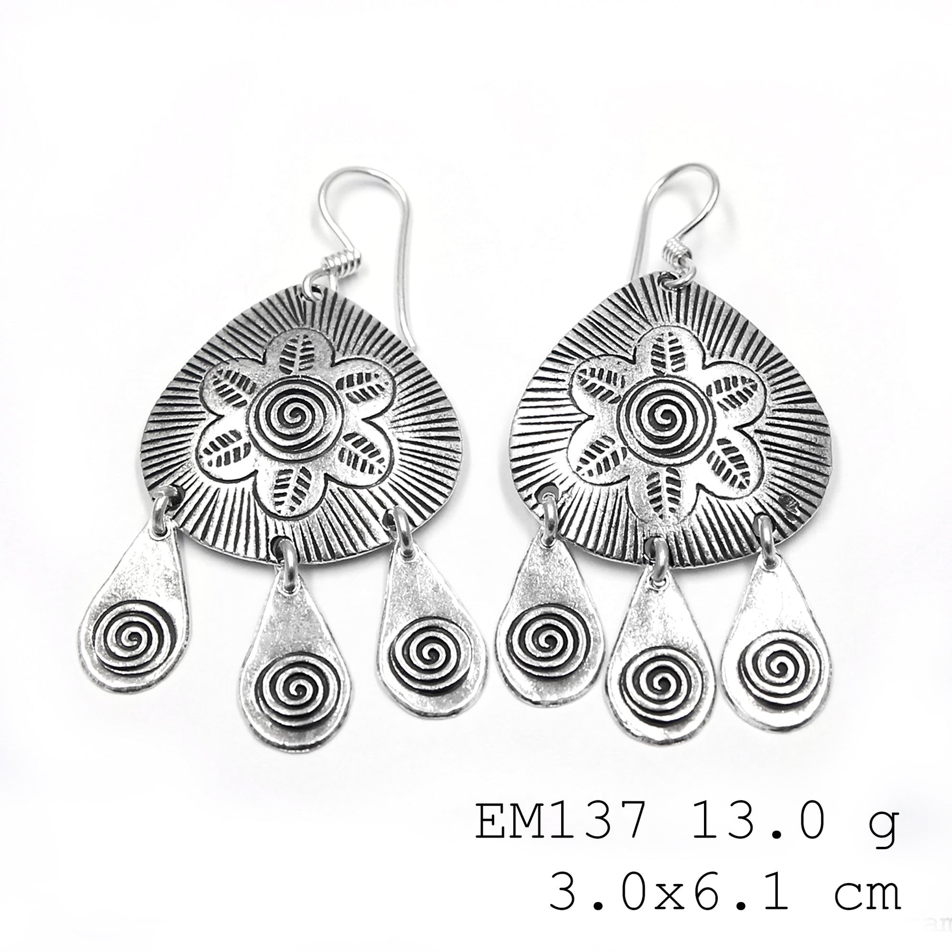 98% pure. 100% gorgeous. Shop silver earrings.