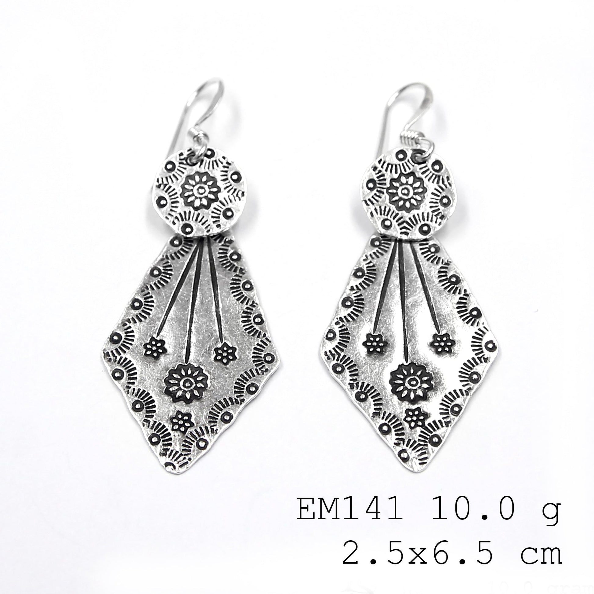 The silver earrings everyone is talking about.