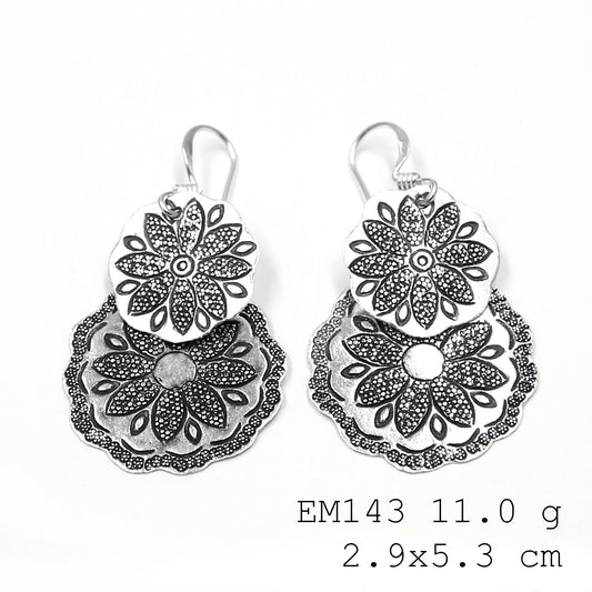 Shop the 98% purity collection: silver earrings.