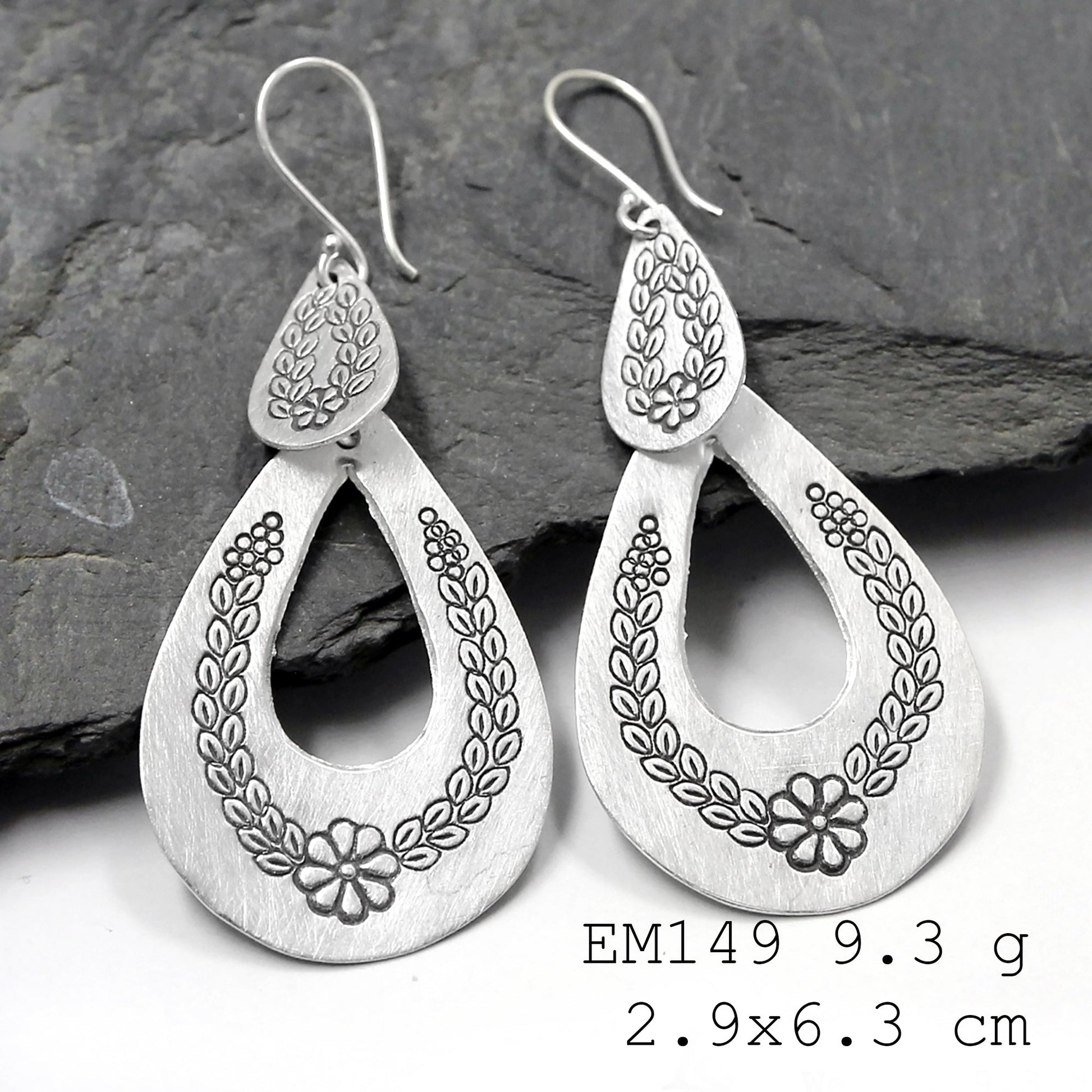 Quality you can feel: Handmade silver earrings.