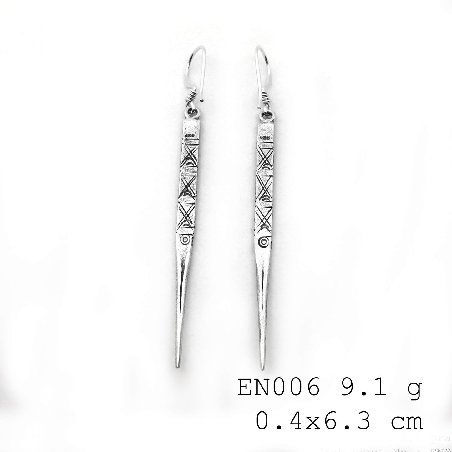 Handmade perfection: Experience the glow of our 98% silver earrings.