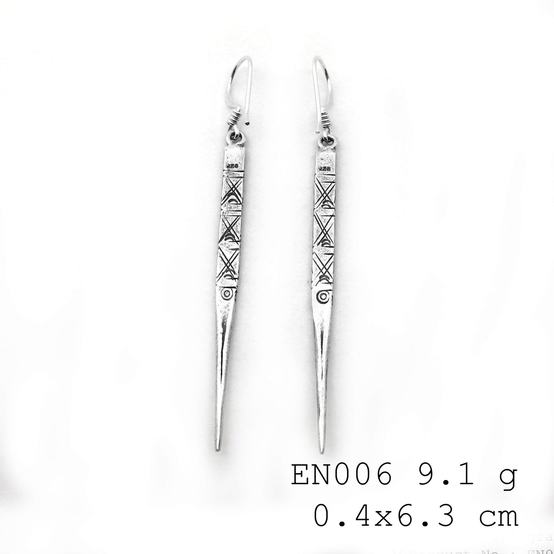 Handmade perfection: Experience the glow of our 98% silver earrings.