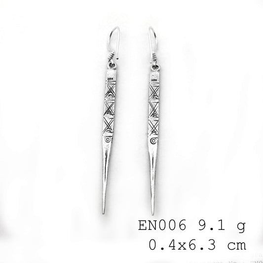 Handmade perfection: Experience the glow of our 98% silver earrings.