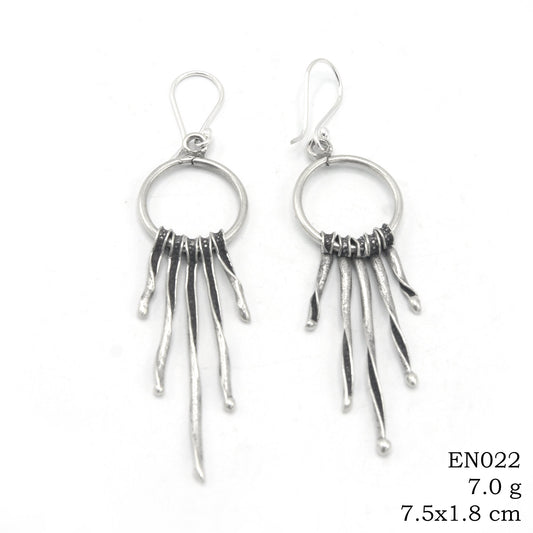 The secret to a perfect outfit? These 98% pure silver earrings.