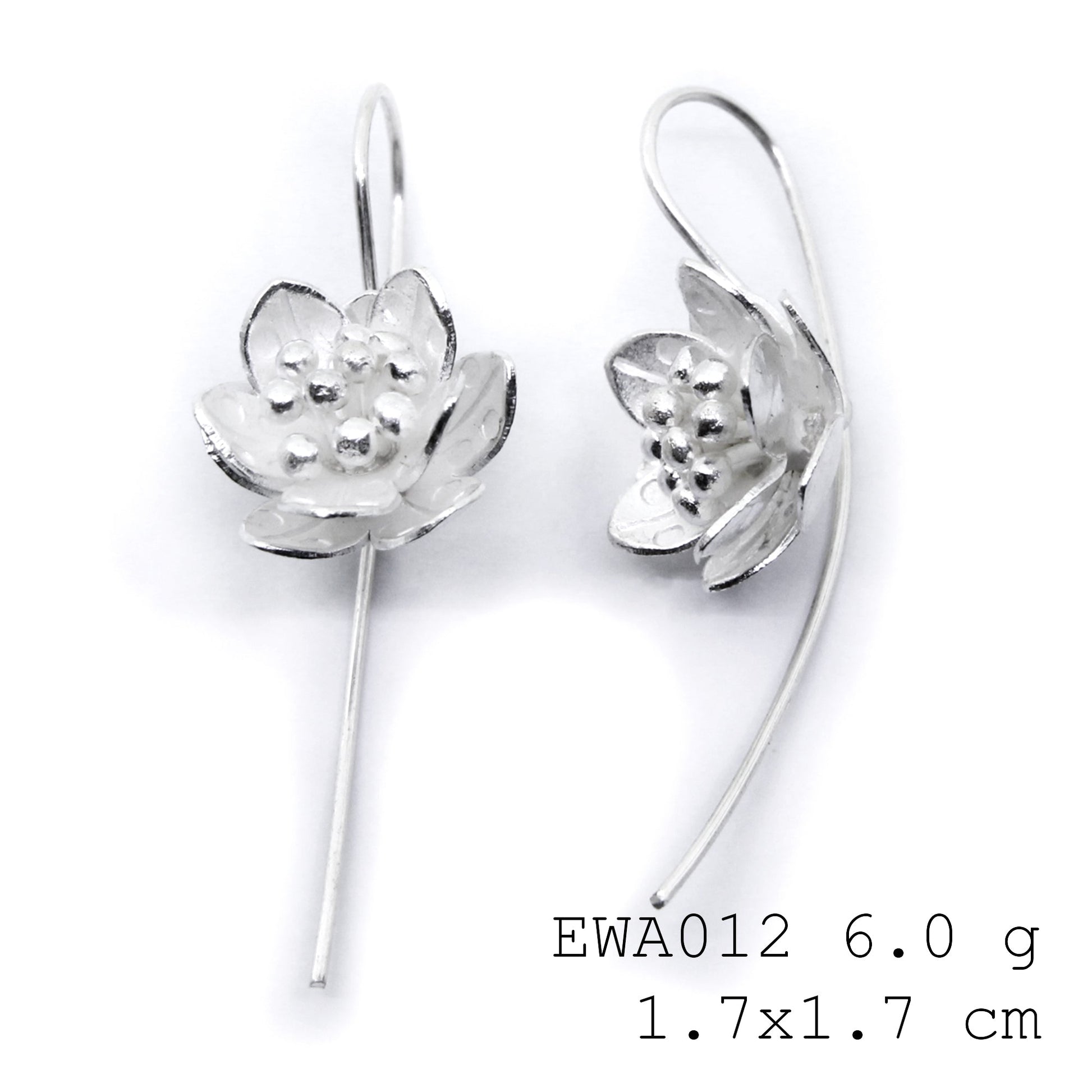 Not just jewelry—it’s art. Handmade white flower silver earrings.