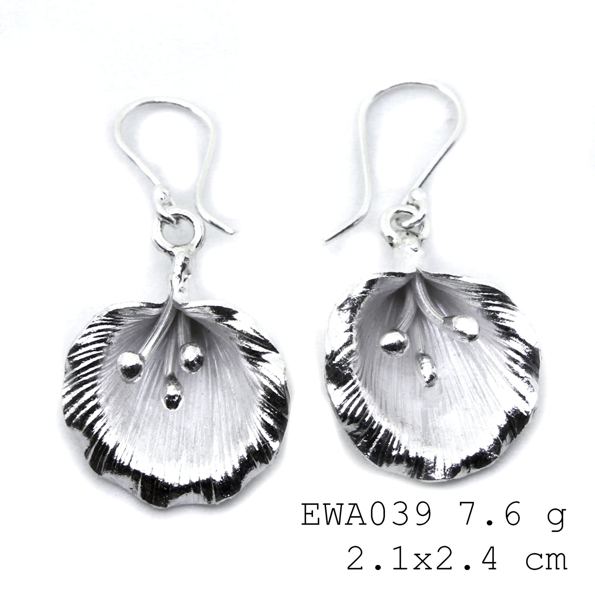 From weddings to weekends: White flower silver earrings.